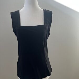 Black shell with becoming neckline
